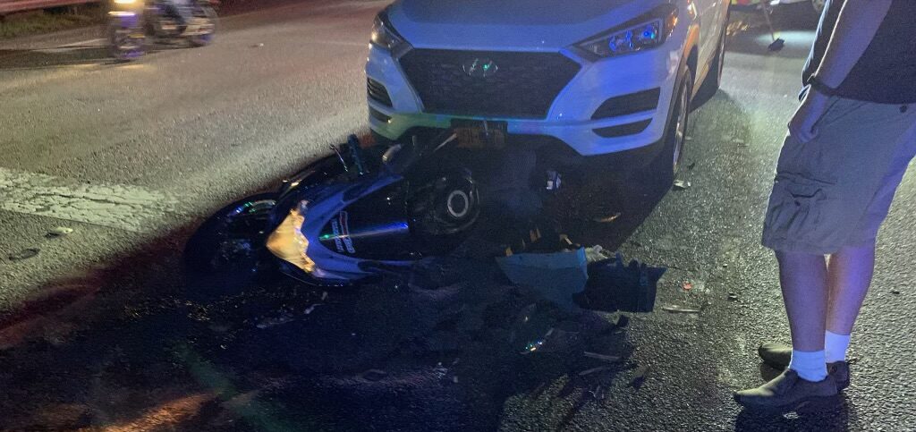 A photo of the first wreck that paralyzed Matt, a car rear ended his motorcycle.