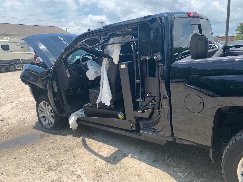 Matt's truck totaled after a car hit them head on.