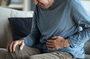 Senior man with stomach pain