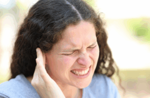 Woman complaining suffering ear ache