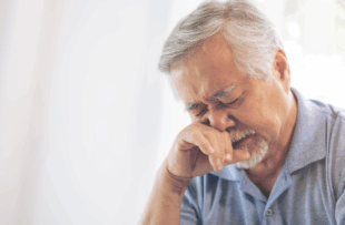 Asian senior man , retired old man Waking up with allergies