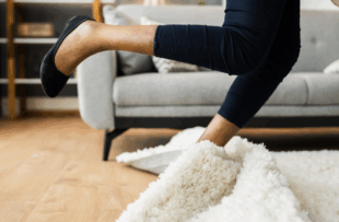 Falldown Hazard. Clumsy Woman Stumbled On Rug