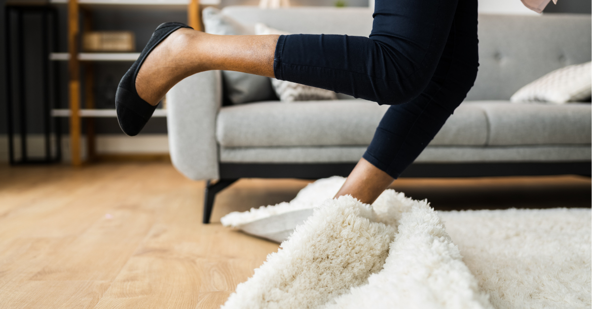 Falldown Hazard. Clumsy Woman Stumbled On Rug