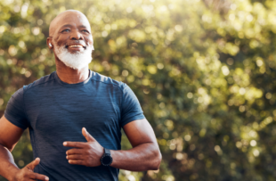 enior male, outdoor runner and motivation for fitness, energy and healthy exercise training with earphones