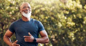 enior male, outdoor runner and motivation for fitness, energy and healthy exercise training with earphones